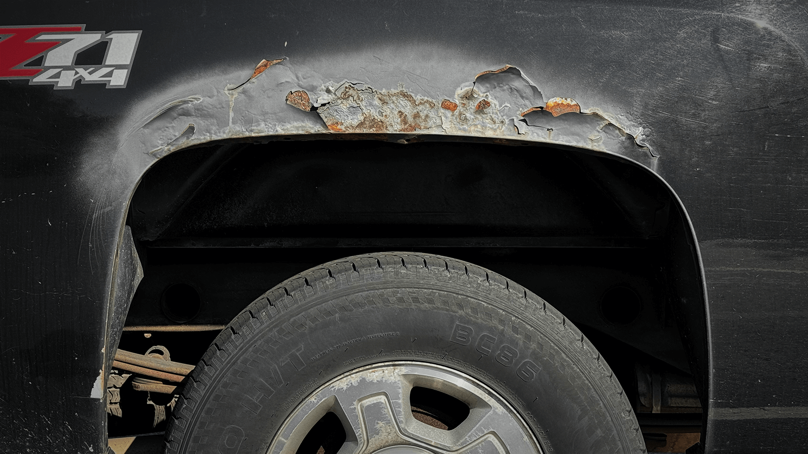 Truck bed with rust and body filler