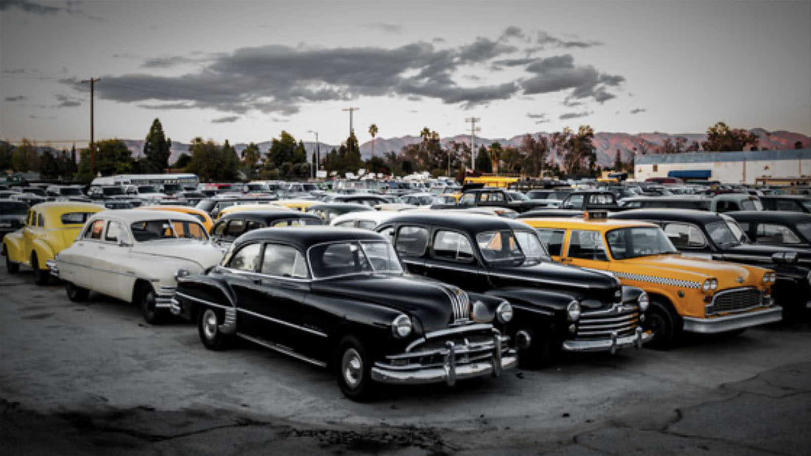 A lot full of movie cars at Cinema Vehicles in California